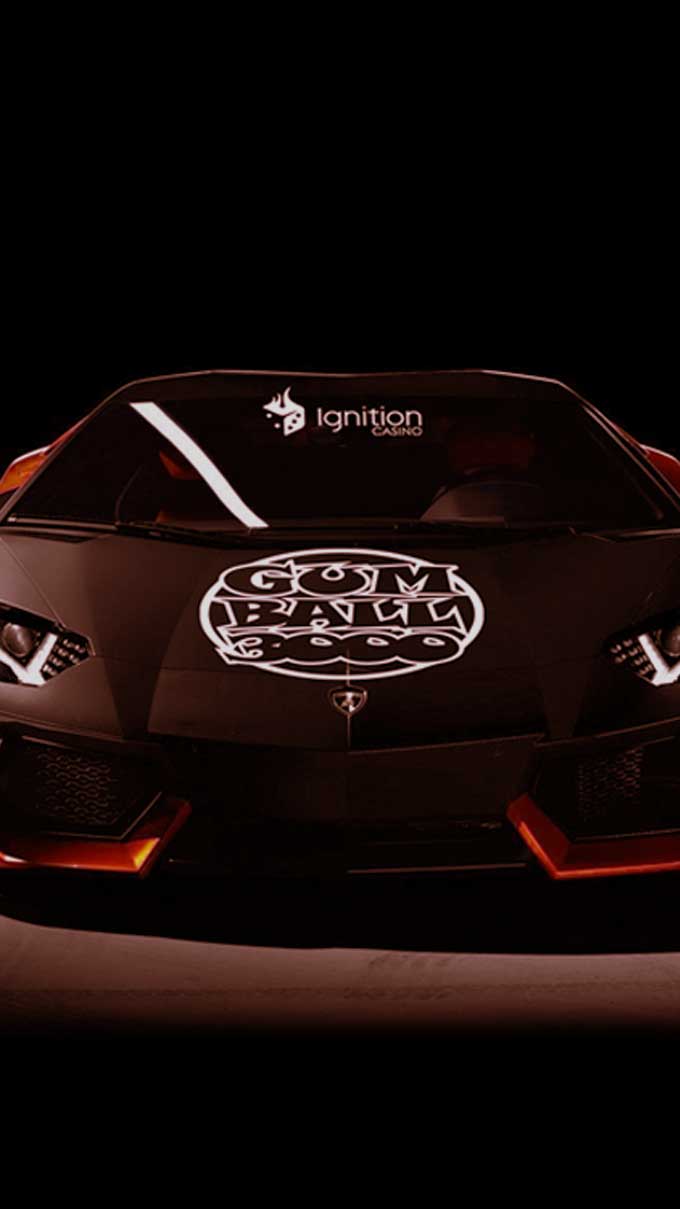 The Gumball 30000 and Ignition Casino car in the darkness