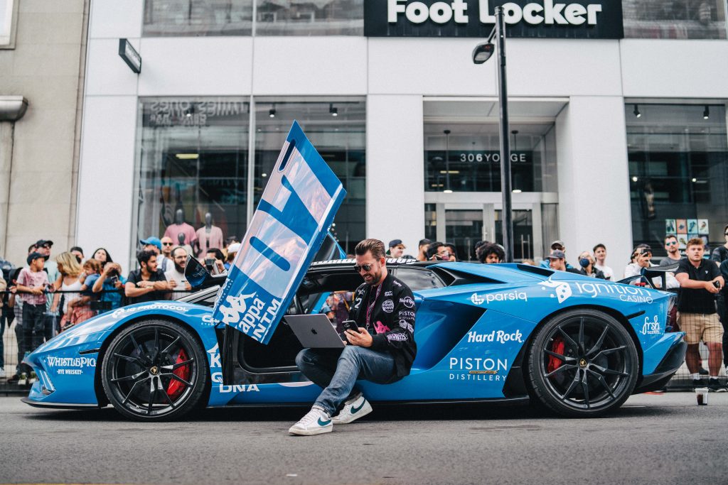 Gumball 3000 car with doors opened in Toronto